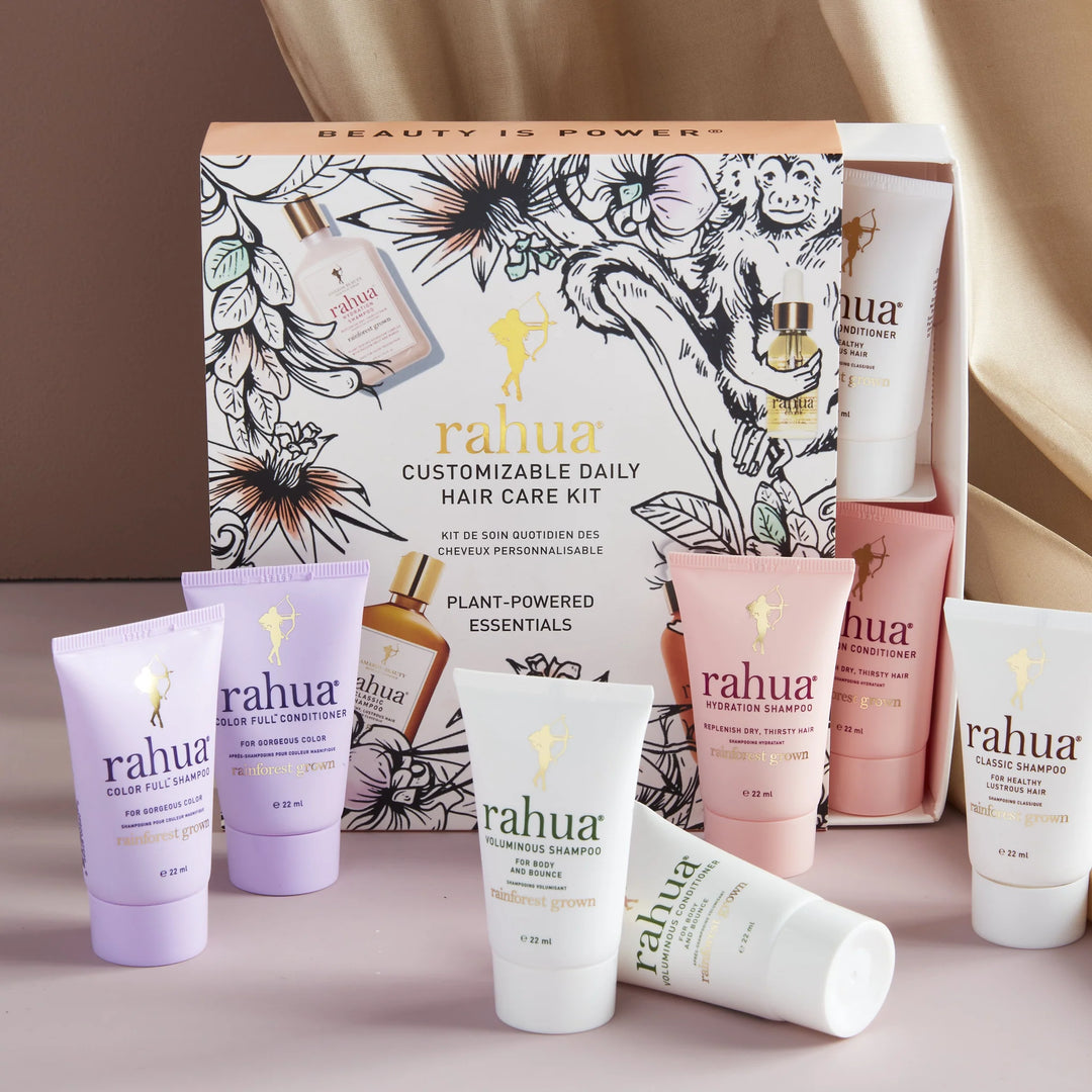 Customizable Daily Hair Care Set Verpackung mit 6 verschiedenen Rahua Produkten in Travel Size Format. North Glow