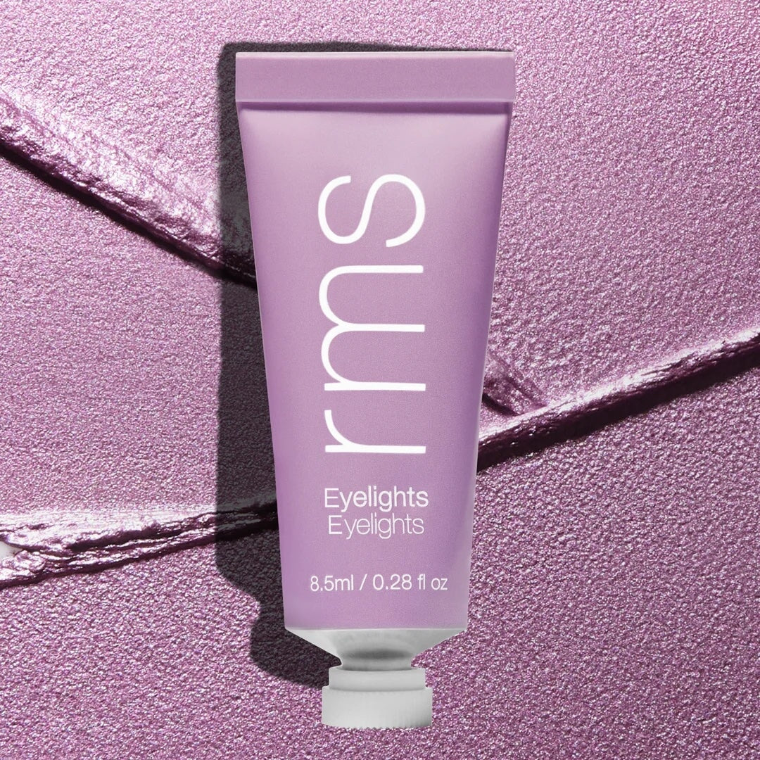 Tube Eyelights Cream Eyeshadow Aurora vor Farb- und Texturbeispiel.