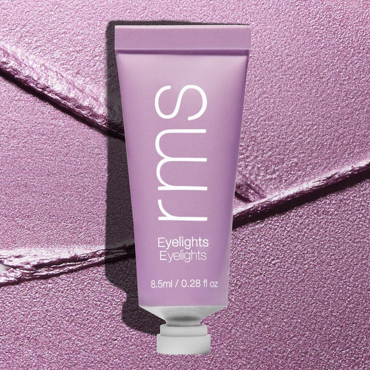 Tube Eyelights Cream Eyeshadow Aurora vor Farb- und Texturbeispiel.
