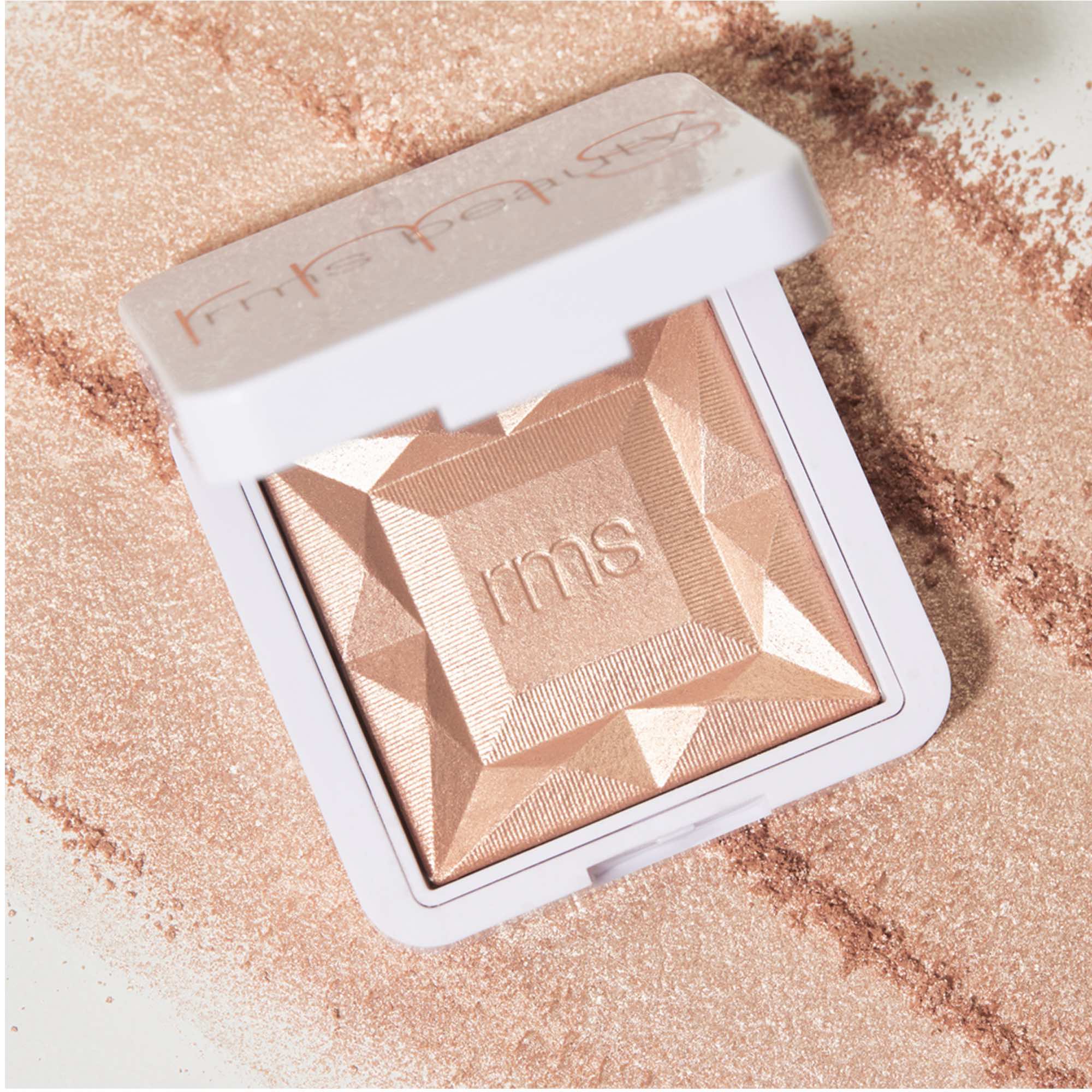 Offene Dose des ReDimension Hydra Dew Luminizers auf Textur- und Farbbeispiel .