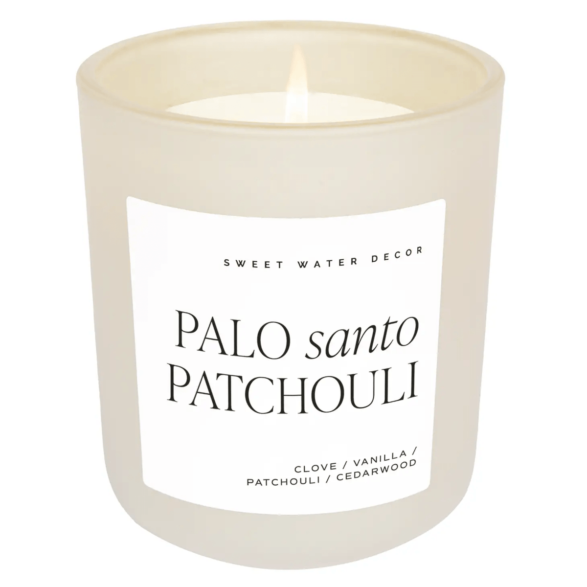 Duftkerze Palo santo Patchouli im Milchglas vor transparentem Hintergrund.