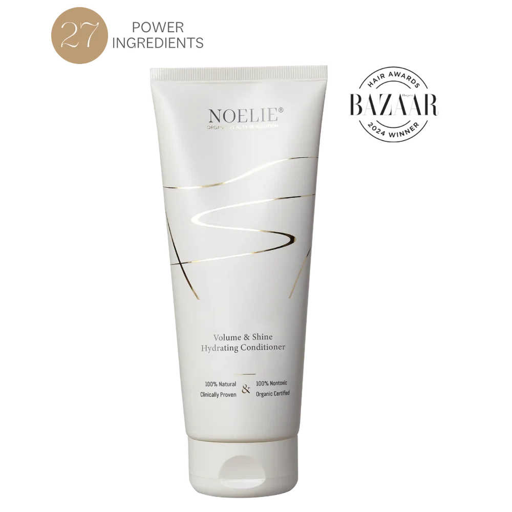 NOELIE Volume & Shine Hydrating Conditioner vor weißem Hintergrund.