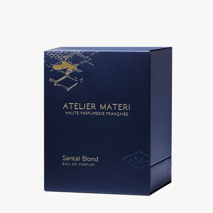 Dunkelblaue Verpackung "Santal Blond" von Atelier Materi vor weißem Hintergrund.