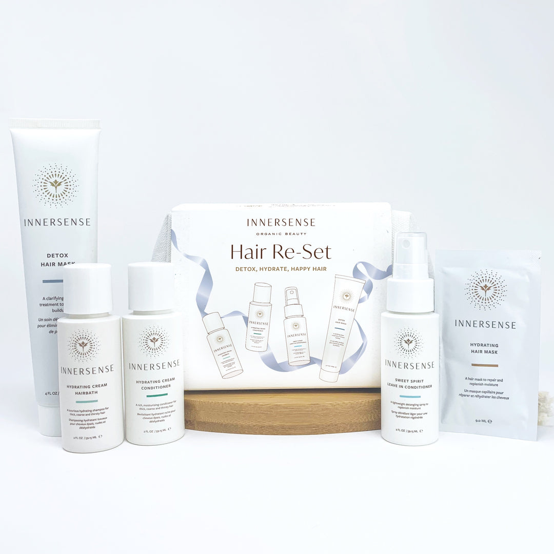 INNERSENSE Hair Re-Set Verpackung sowie alle dazugehörigen Produkte stehen nebeneinander vor weißem Hintergrund. North Glow