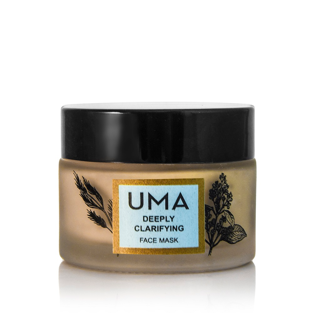 UMA Deeply Clarifying Face Mask Schraubglas mit schwarzem Deckel steht vor weißem Hintergrund.
