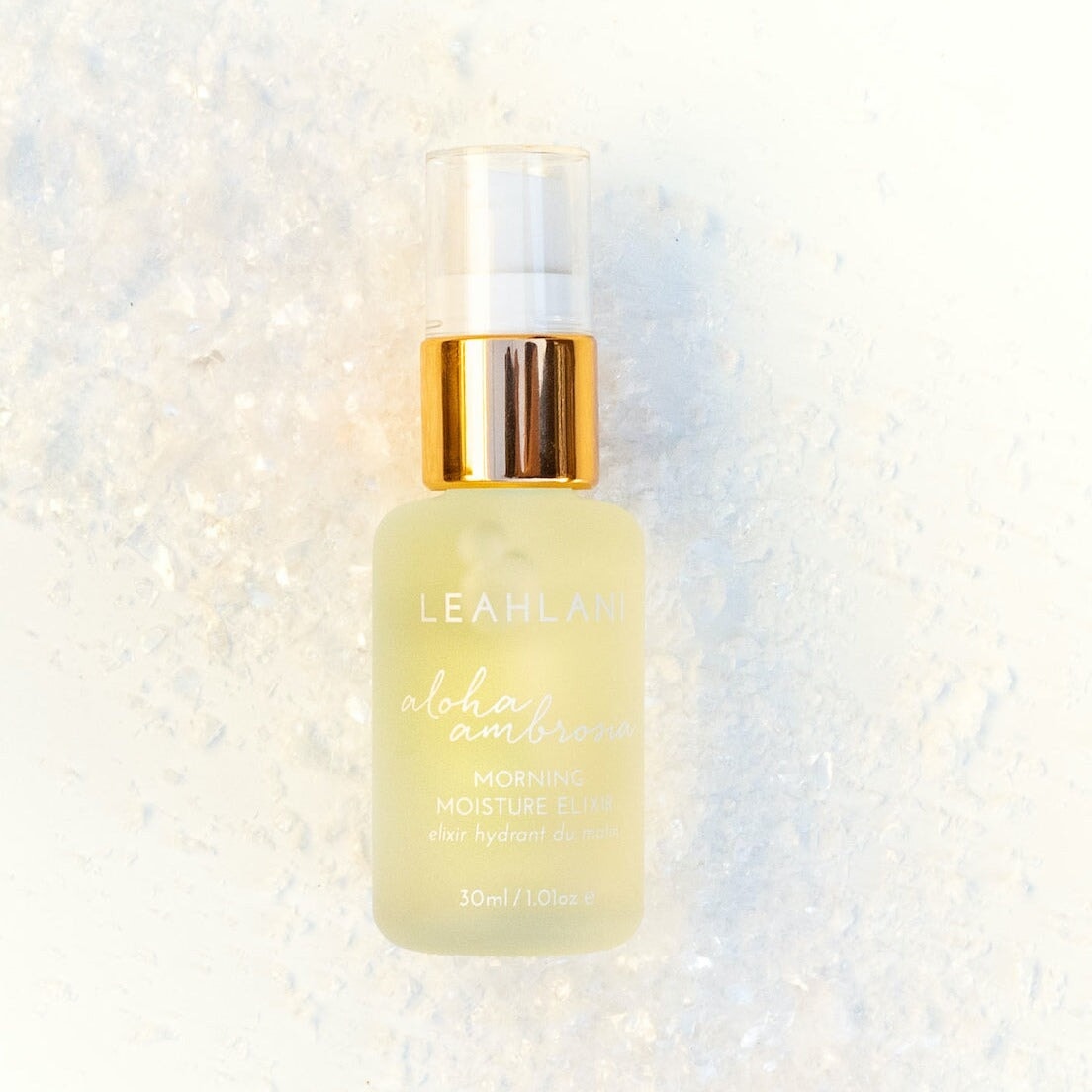 Leahlani Aloha Ambrosia Elixir Glasflasche vor hellem Hintergrund