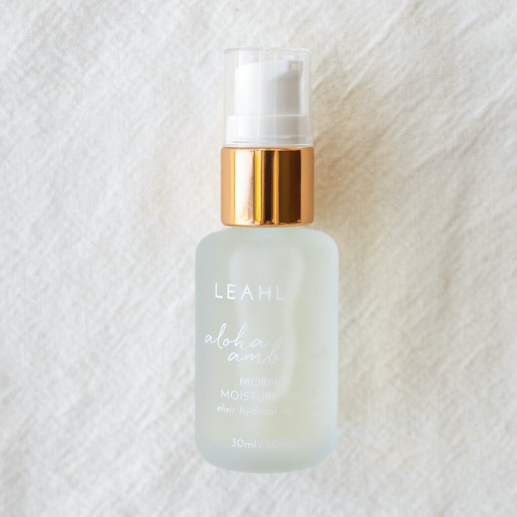 Leahlani Aloha Ambrosia Elixir Glasflasche vor weißem Hintergrund North Glow