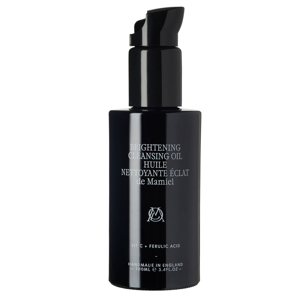 De Mamiel Brightening Cleansing Oil schwarze Flasche vor weißem Hintergrund
