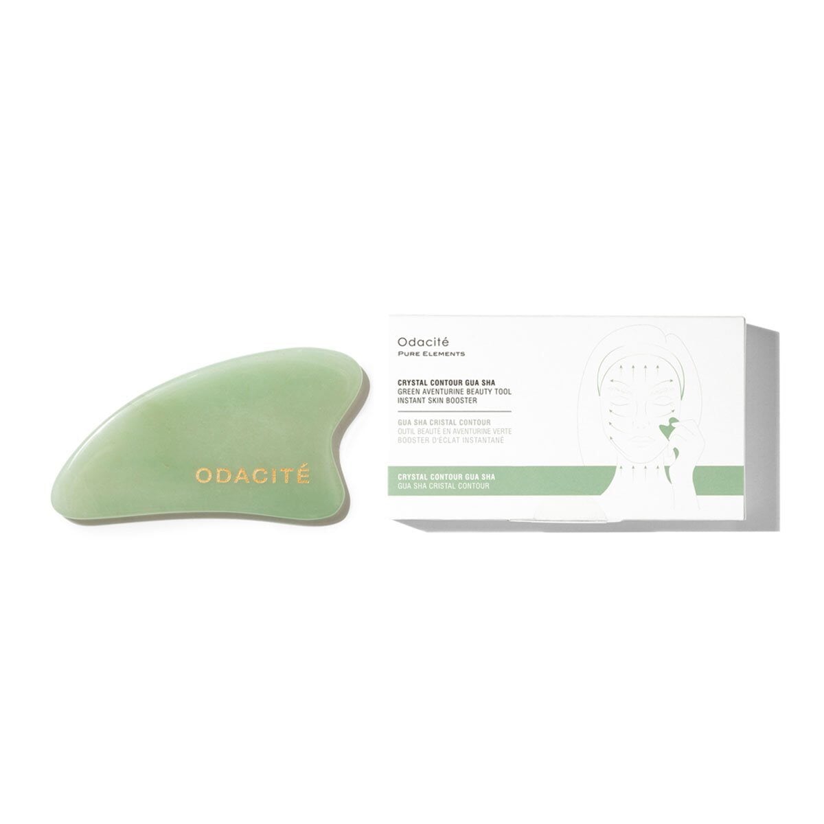 Green Aventurine Crystal Contour Gua Sha von Odacité neben der edlen Verpackung