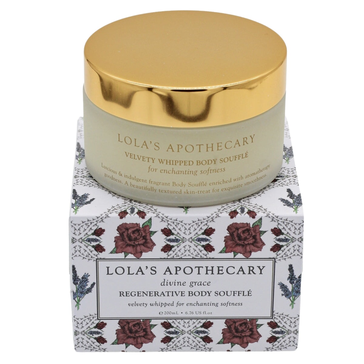 Lola´s Apothecary Divine Grace Body Souffle Tiegel mit Verpackung vor hellem Hintergrund