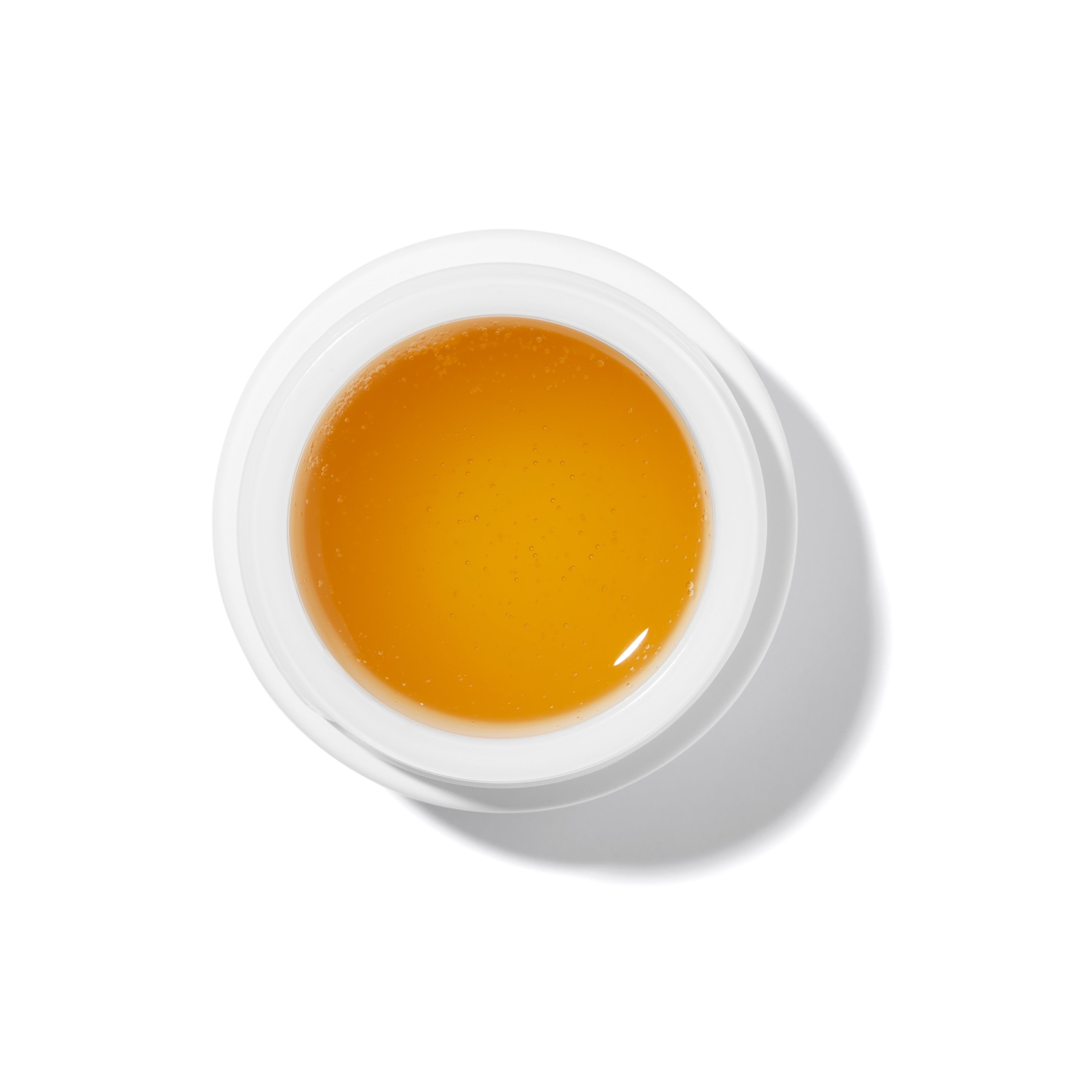 Agent Nateur Holi (Bright) Mask weißer Tiegel mit oranger Textur auf weißem Hintergrund