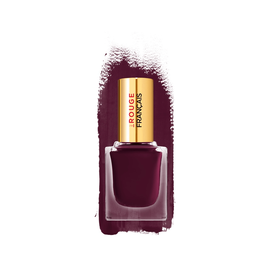 Glasflasche Le Vernis No 917 Rouge Porphyra Nagellack vor einem Farbbeispiel auf weißem Hintergrund. North Glow
