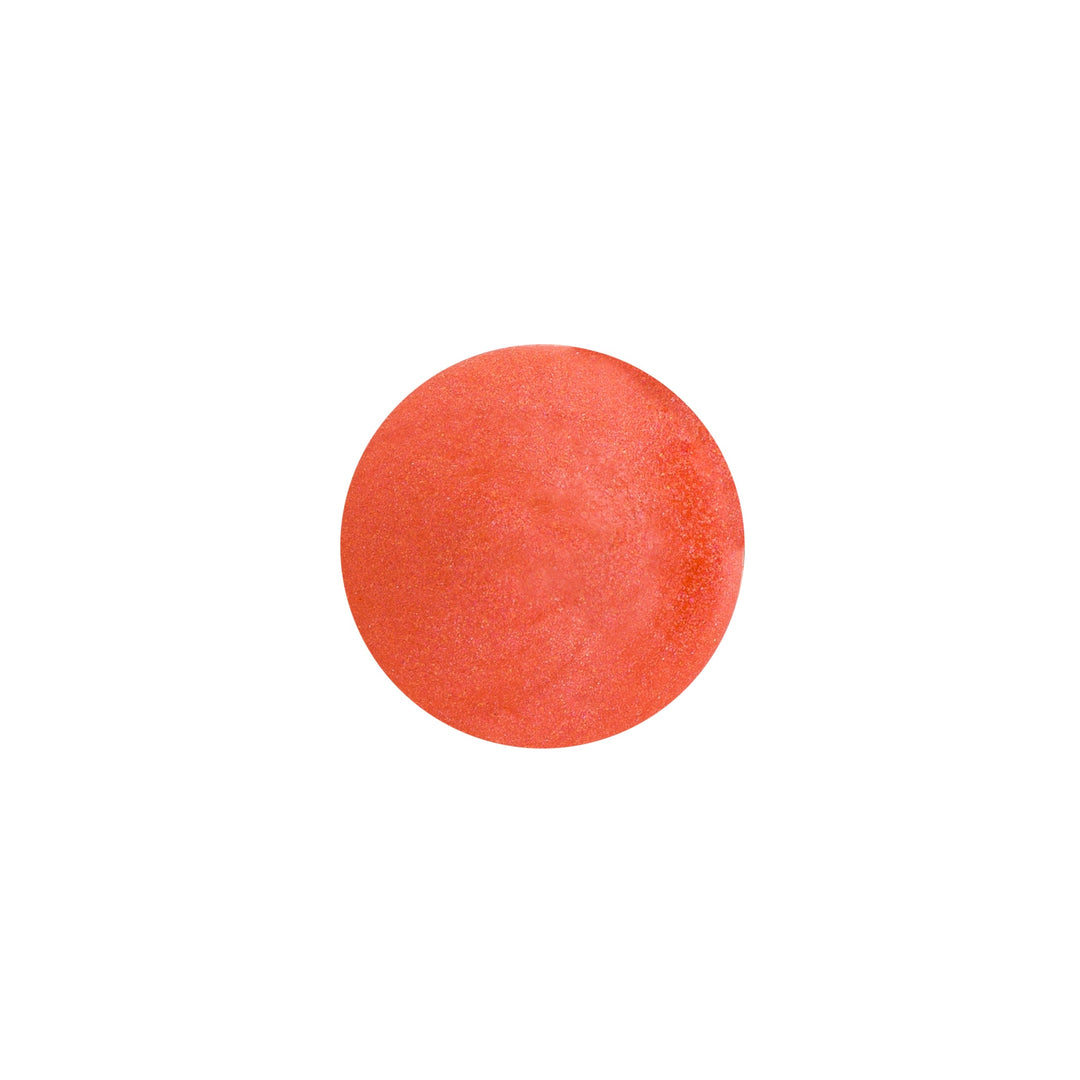 Farb- und Texturbeispiel der Lippenstiftfarbe Coral von Henné Organics. North Glow