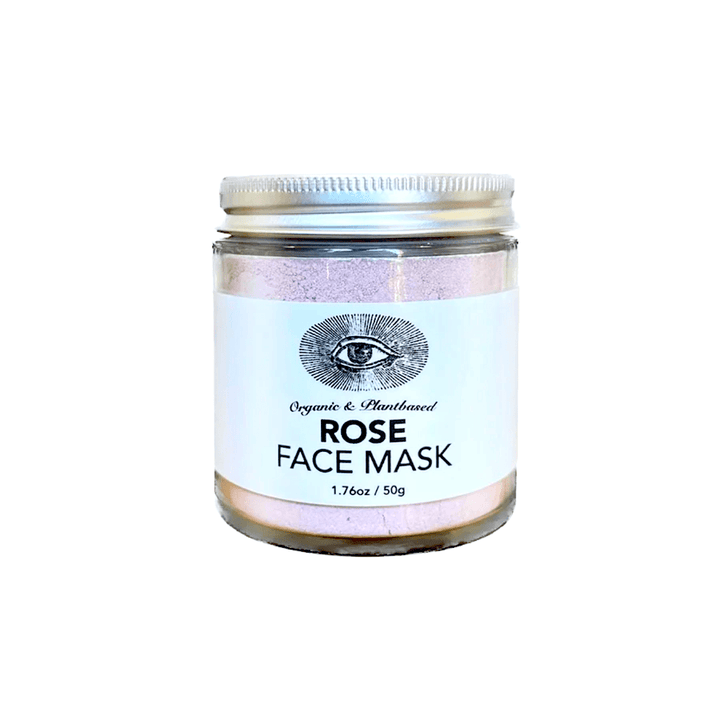 Anima Mundi Rose Face Mask Schraubglas mit silbernen Deckel und rosafarbenem Pulver, steht vor weißem Hintergrund.