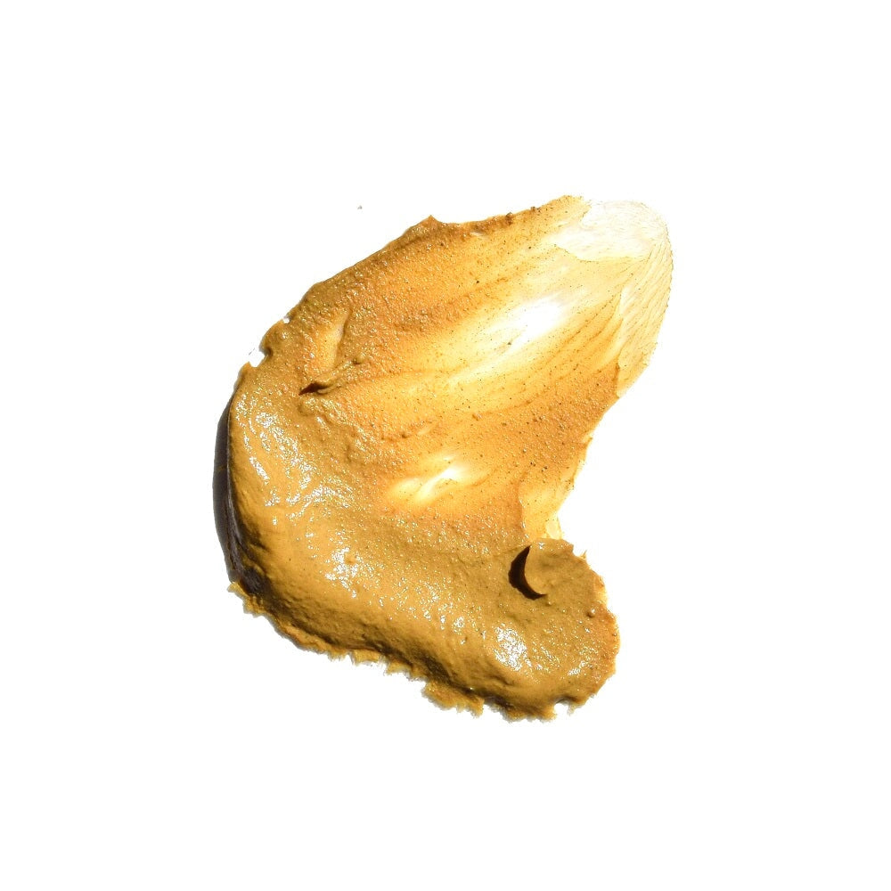 Texturbeispiel der UMA Ultimate Brightening Face Mask auf weißem Grund.