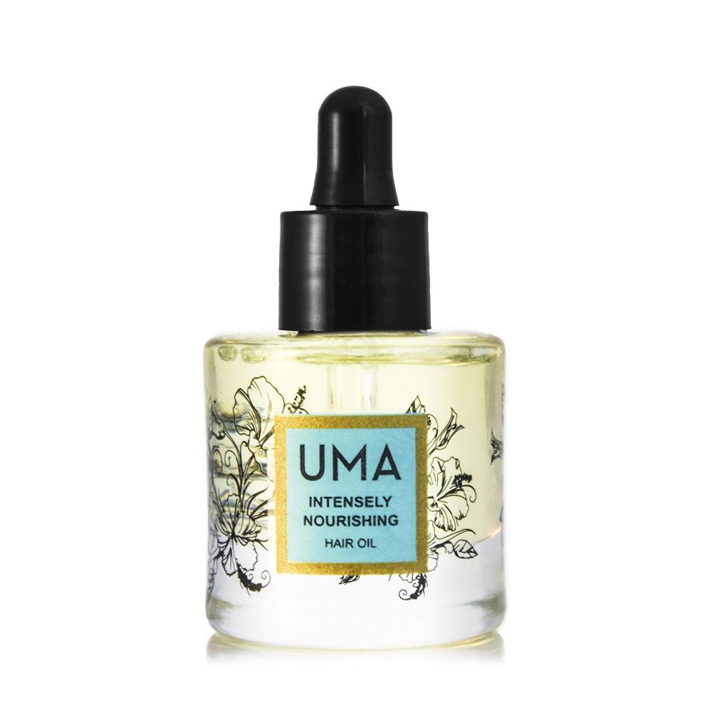 UMA Intensely Nourishing Hair Oil Flasche mit Pipette steht vor weißem Hintergrund.