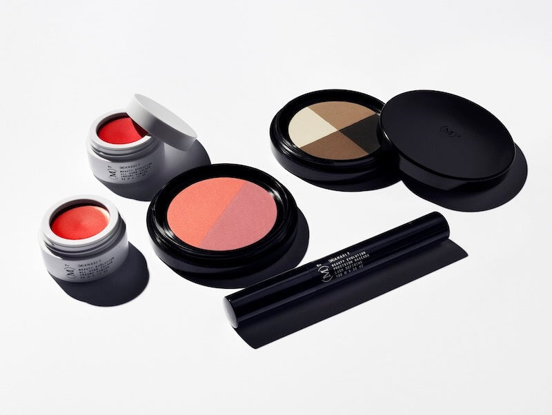 5 different Manasi 7 products lie open on a white background.