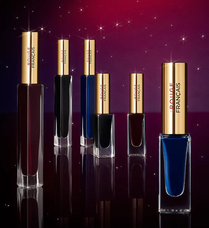 Verschiedene Le Rouge Francais Eyeliner vor dunklem Hintergrund.