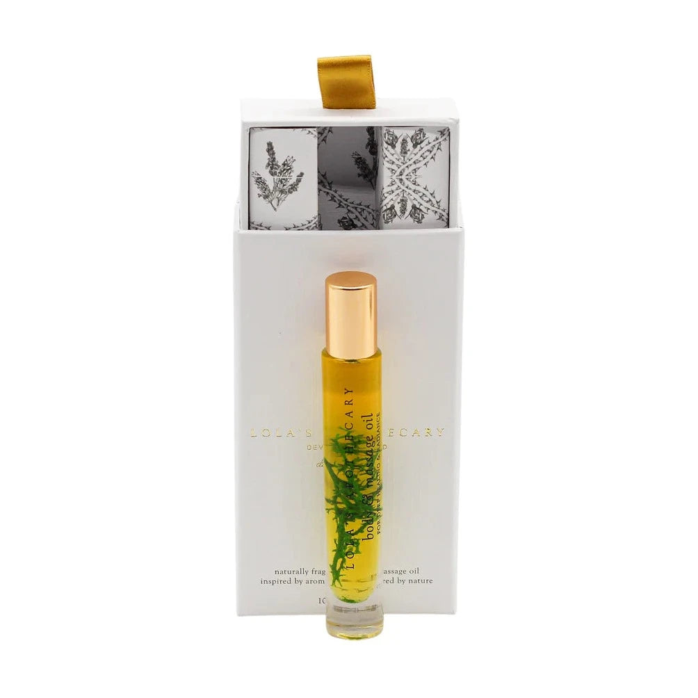 Breath of Clarity body & massage oil - Glasflasche mit goldenem Deckel vor< weißer Geschenkverpackung North Glow