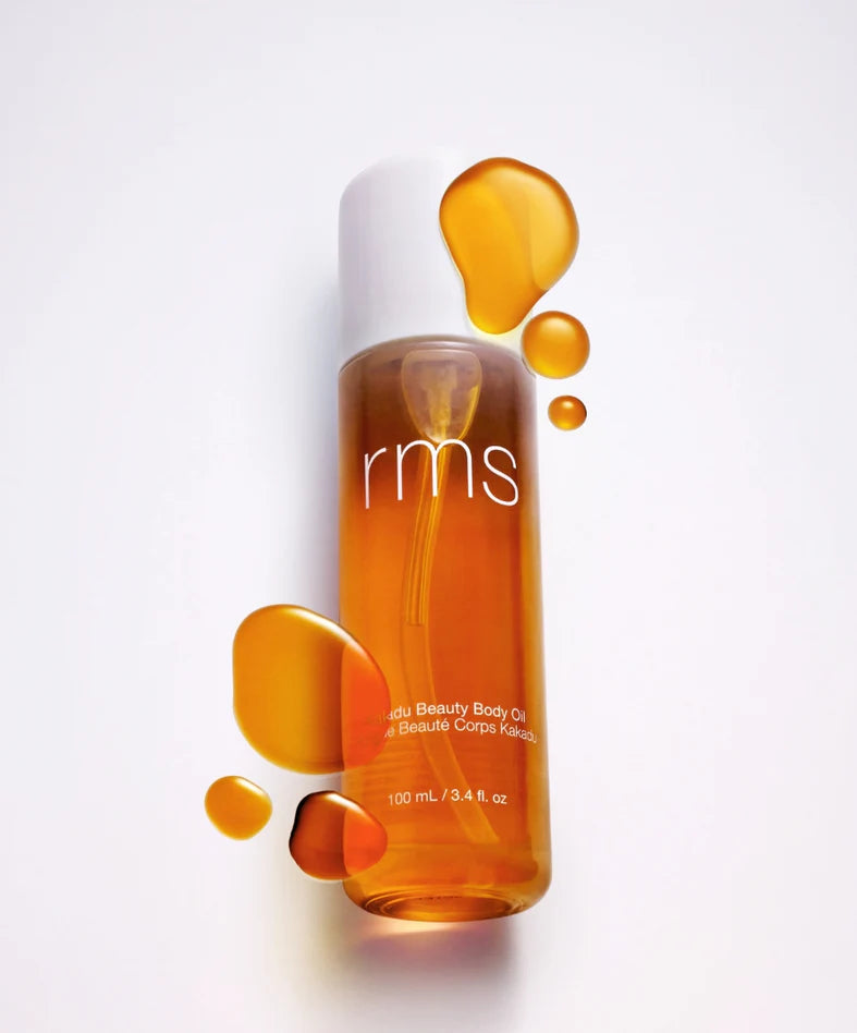 Kakadu Beauty Body Oil Textur mit Glasflasche