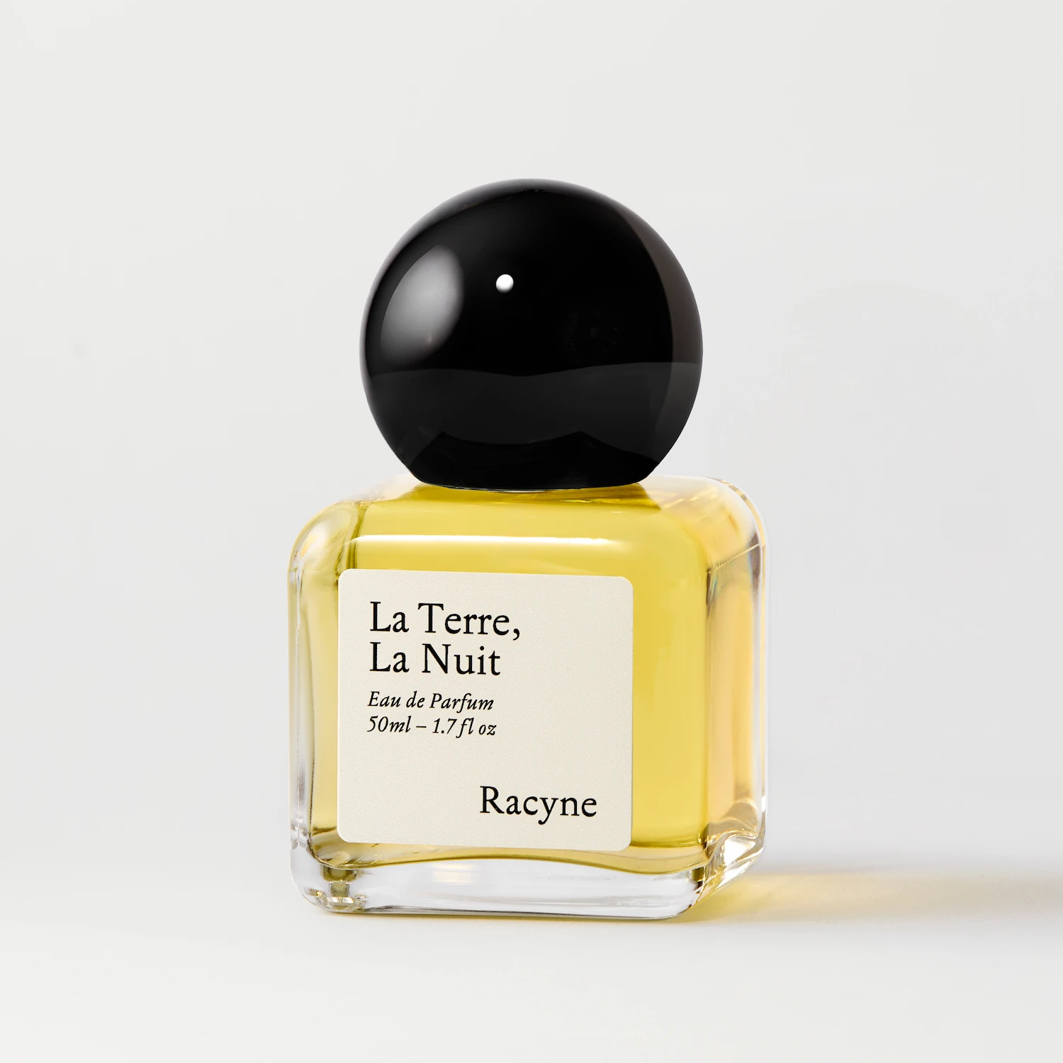 Racyne La Terre, La Nuit Eau de Parfum 50 ml im transparenten Glasflakon mit schwarzem Kugelverschluss
