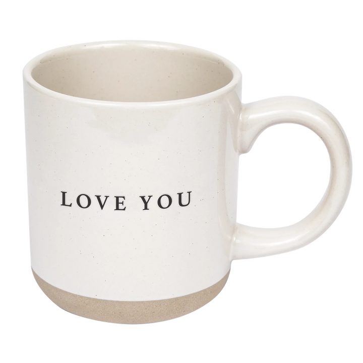 Kaffeetasse vor weißem Hintergrund mit Aufschrift "Love You"