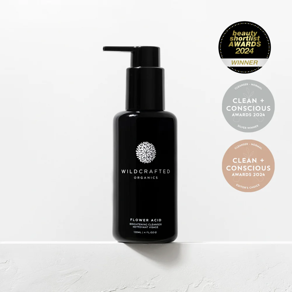 Flower Acid Brightening Cleanser von Wildcrafted Organics in Glasflasche mit Pumpverschluss – luxuriöse Naturkosmetik für strahlende Haut North Glow