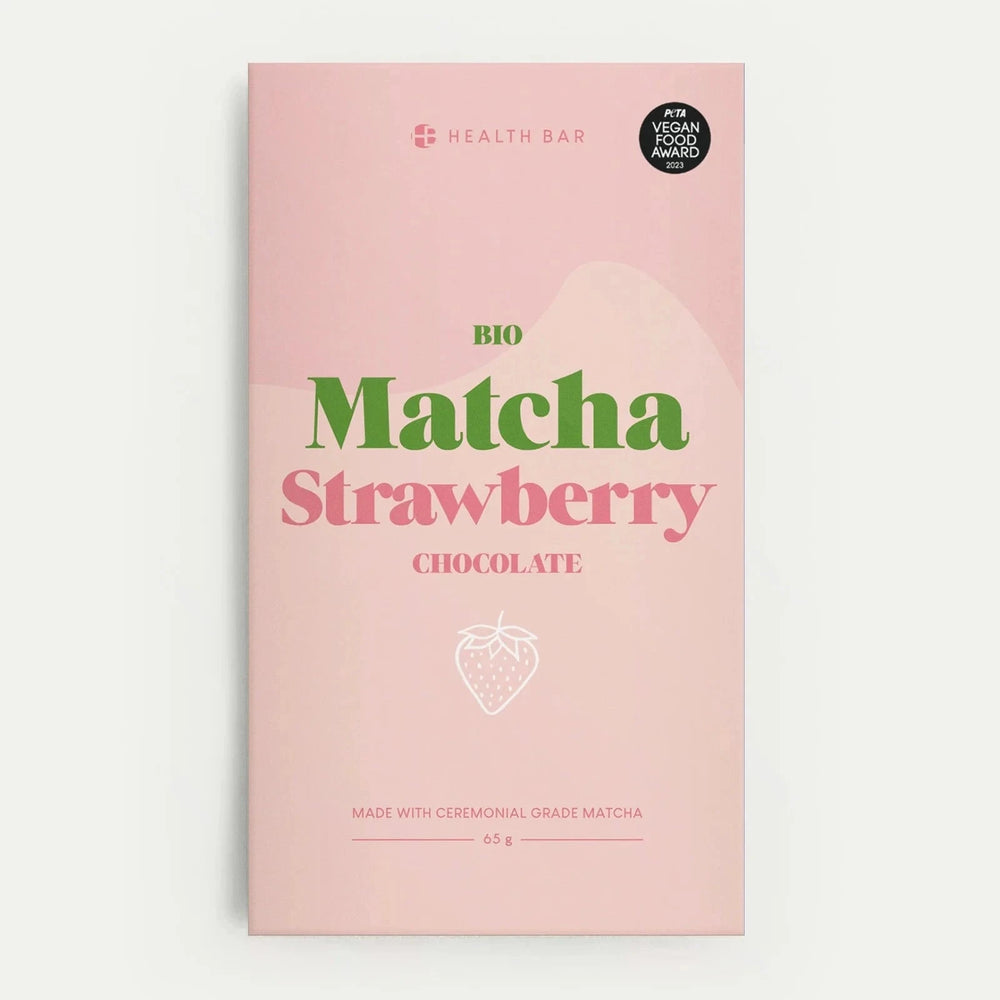 Bio Matcha Strawberry Chocolate, rosafarbende Verpackung vor weißem Hintergrund.