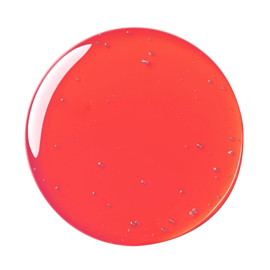 Roter Kreis (Cleansing Oil SLAVENTINA von Le Rouge Francais) auf weißem Untergrund.