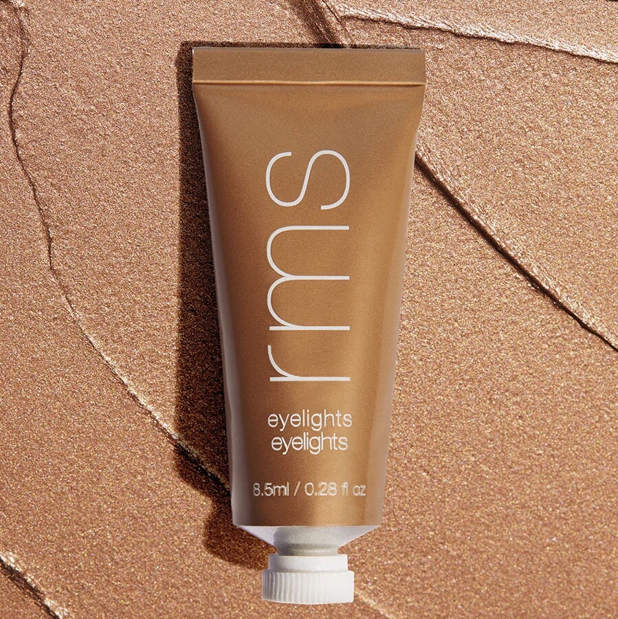 Tube Eyelights Cream Eyeshadow Flare vor Farb- und Texturbeispiel.