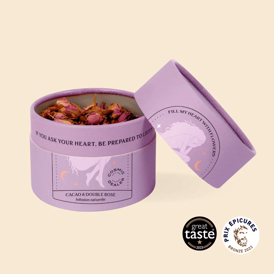 Offene Cacao&Double Rose Tee Dose Cosmic Dealer mit angelehntem Deckel.