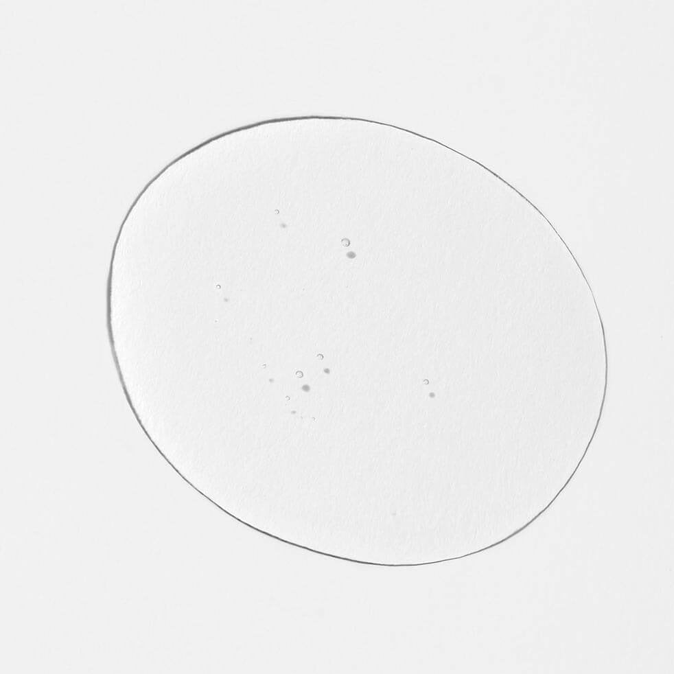 Texturbeispiel Harmonic Treatment Oil von Innersense auf weißem Hintergrund North Glow
