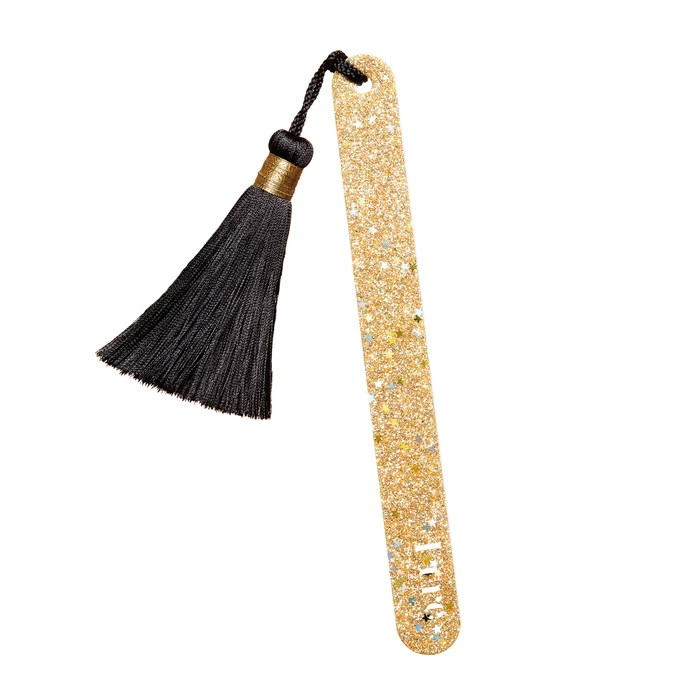 Kure BAZAAR goldene Glitzernagelfeile vor weißem Hintergrund.