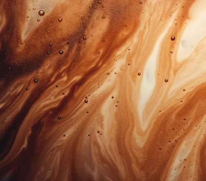 Cacao-Schaum in verschiedenen Brauntönen.