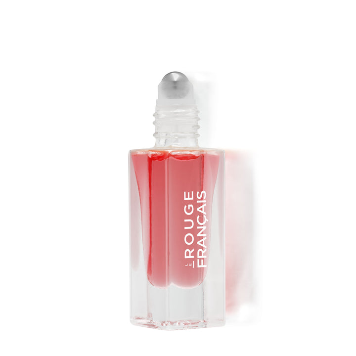 Offene Le Rouge Francais Le Nectar No 614 Artemis Glasflasche mit Kugelapplikator vor weißem Hintergrund.