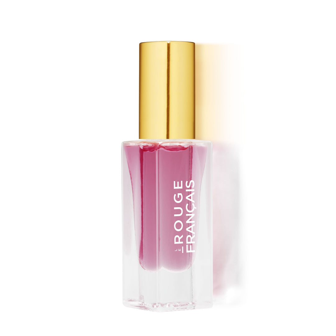 Le Rouge Francais Le Nectar Lippenöl  Glasflasche vor weißem Hintergrund.