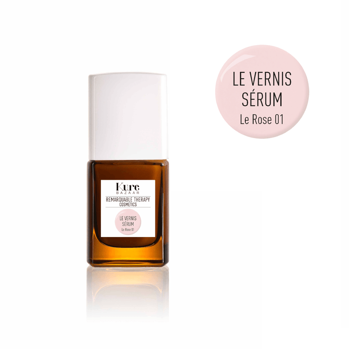 Le Vernis Serum Rose 01  Nagellackflasche steht vor weißem Hintergrund.