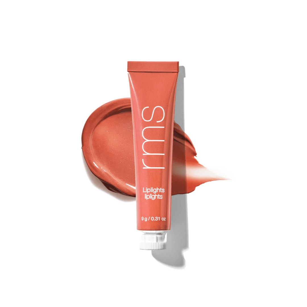 RMS Liplights Bisou Tube vor einem Farb- und Texturbeispiel vor weißem Hintergrund.