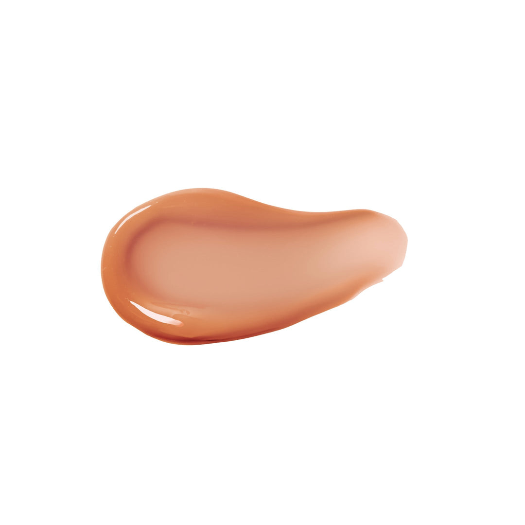 Klecks des Legendary Lip Oil Farbe Amber. North Glow