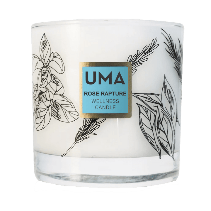 UMA Wellness Kerze Roes Rapture in einem transparentes Kerzenglas  vor schwarzem Hintergrund