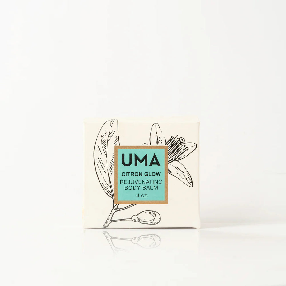 UMA Citron Glow Body Balm Verpackung steht vor weißem Hintergrund.