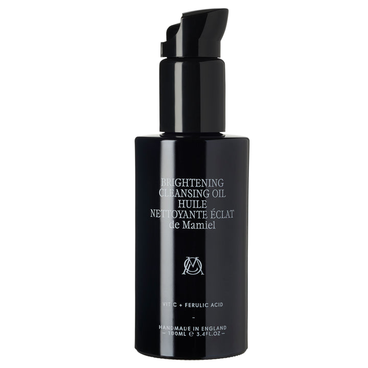 De Mamiel Brightening Cleansing Oil schwarze Flasche vor weißem Hintergrund