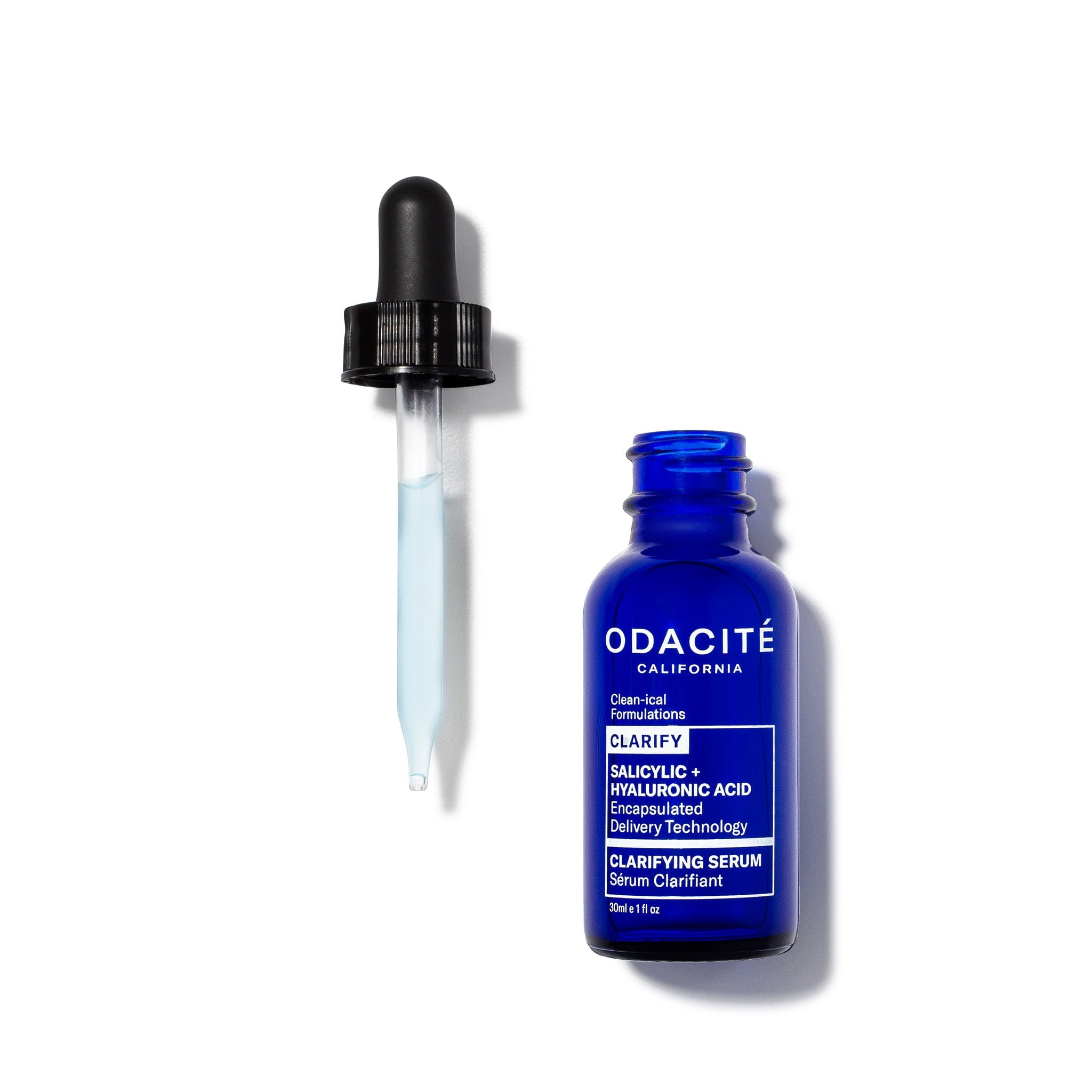 Odacité Clarify Salicylic + Hyaluronic Acid Serum – Pipettenflasche mit schwarzem Deckel auf weißem Hintergrund