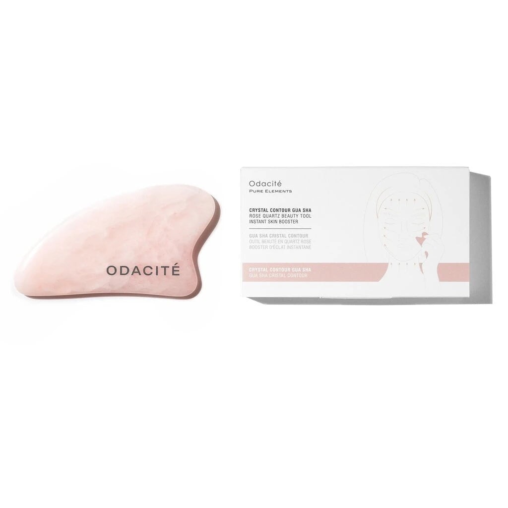 Rose Quarz Crystal Contour Gua Sha von Odacité neben der edlen Verpackung