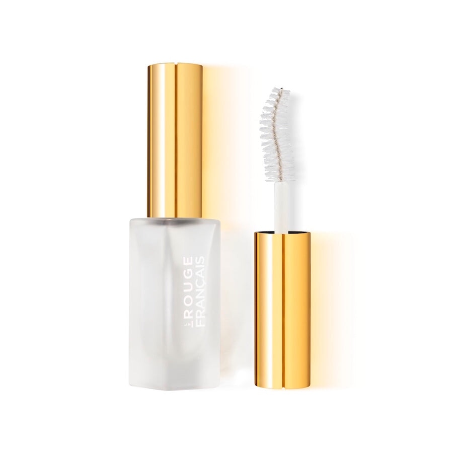 Glasflasche und Bürste des Médusa Wimpernserums Le Rouge Francais stehen vor weißem Hintergrund.