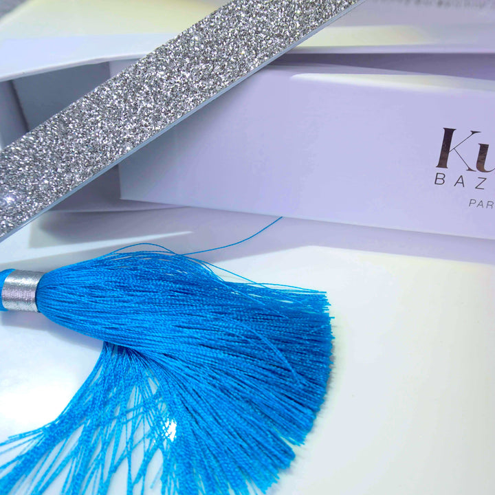 Glitzer Nagelfeile Silber mit blauem Pompon