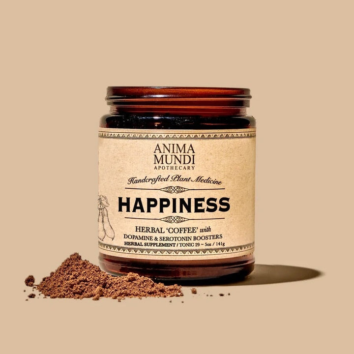 Offenes Anima Mundi Happiness Schraublas mit davor verstreutem Pulver vor hellem Hintergrund.