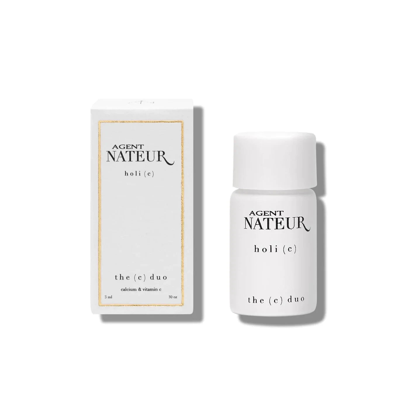 Holi (C) weiße Flasche und Verpackung vor weißem Kintergrund