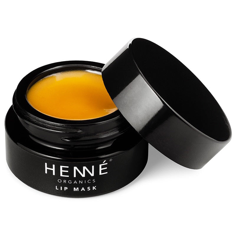 Offener, schwarzer Tiegel der Henné Lip Mask mit angelehntem Deckel vor weißem Hintergrund.