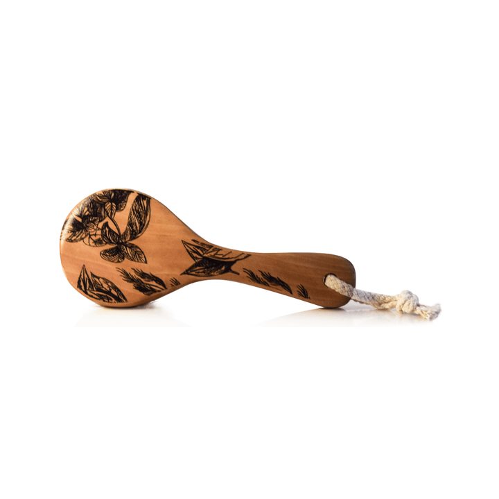 Rückansicht der UMA Lymphatic Detox Dry Brush vor weißem Hintergrund.
